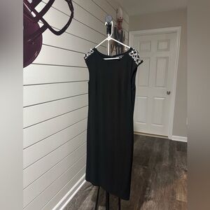 Chic Asymmetrical Black Dress with Silver Details